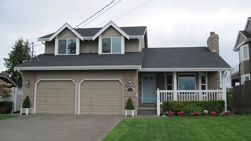 Two-story suburban house with two-car garage