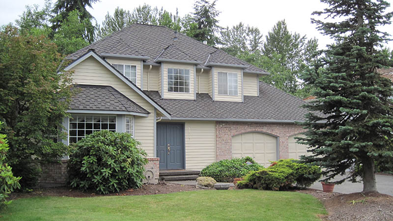 Two-story suburban house with attached garage