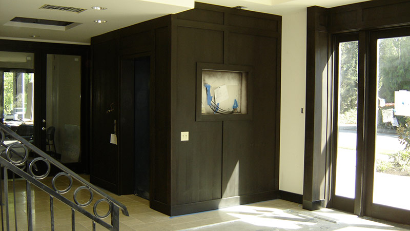 Office lobby with dark wood paneling