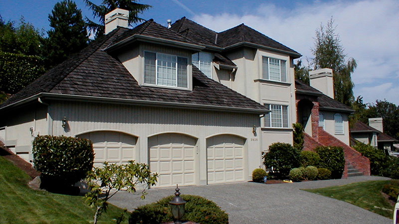 Two-story suburban house with three-car garage