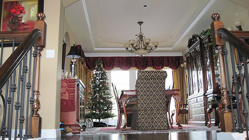 Formal dining room with Christmas tree