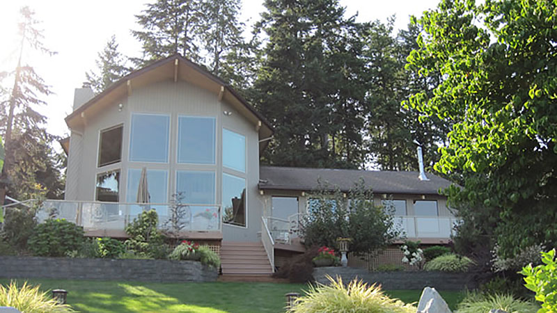 Modern house with large windows and deck
