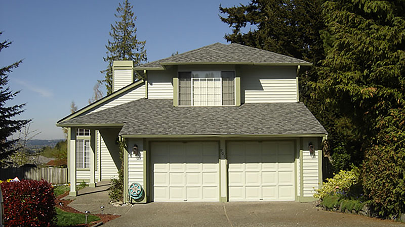 Two story suburban house with double garage