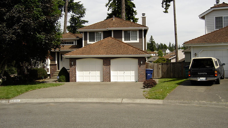 Two-story suburban house with double garage
